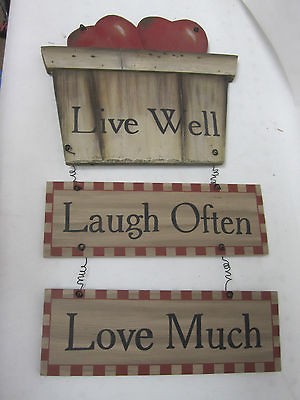   Wooden Plaque Decor reads Live well, laugh often, love much